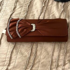 New Brown diamond clutch.